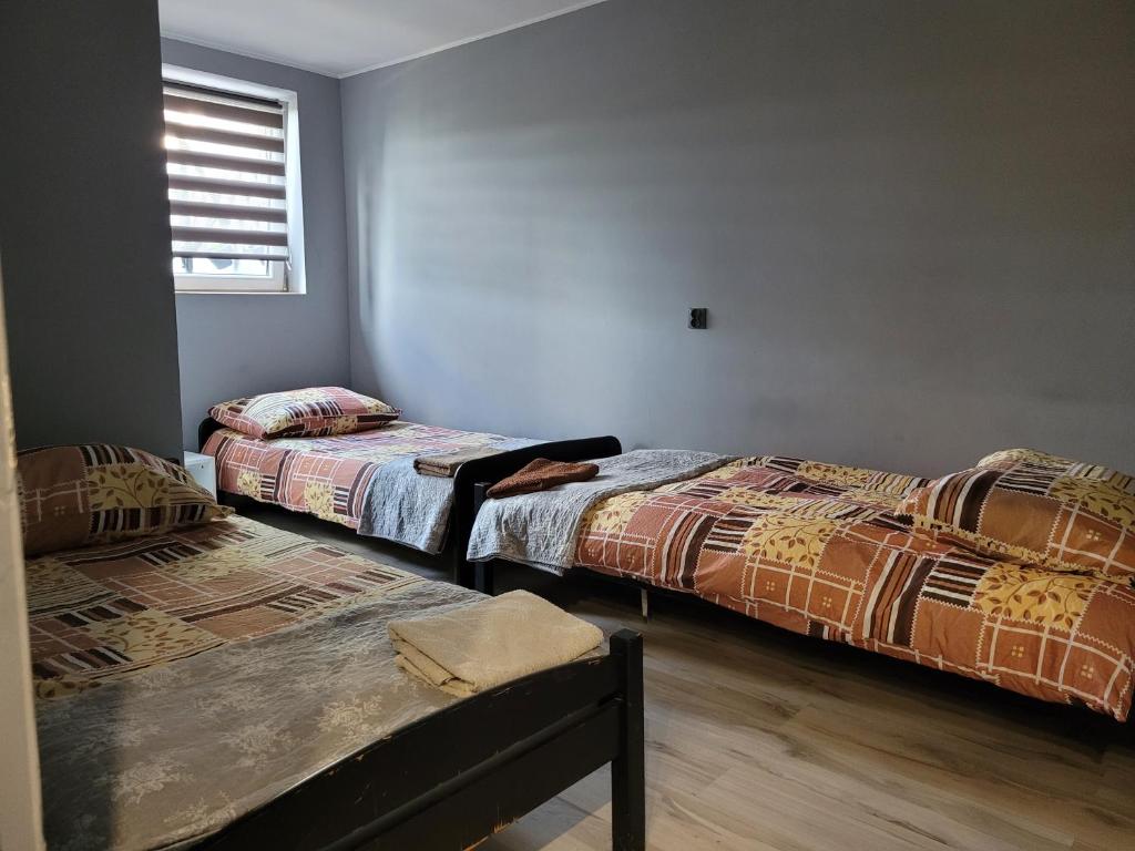 Postel nebo postele na pokoji v ubytování Sebar