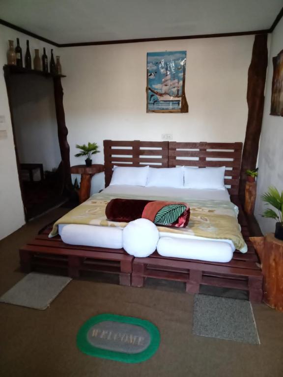 Postel nebo postele na pokoji v ubytování 20/20 wood cabana
