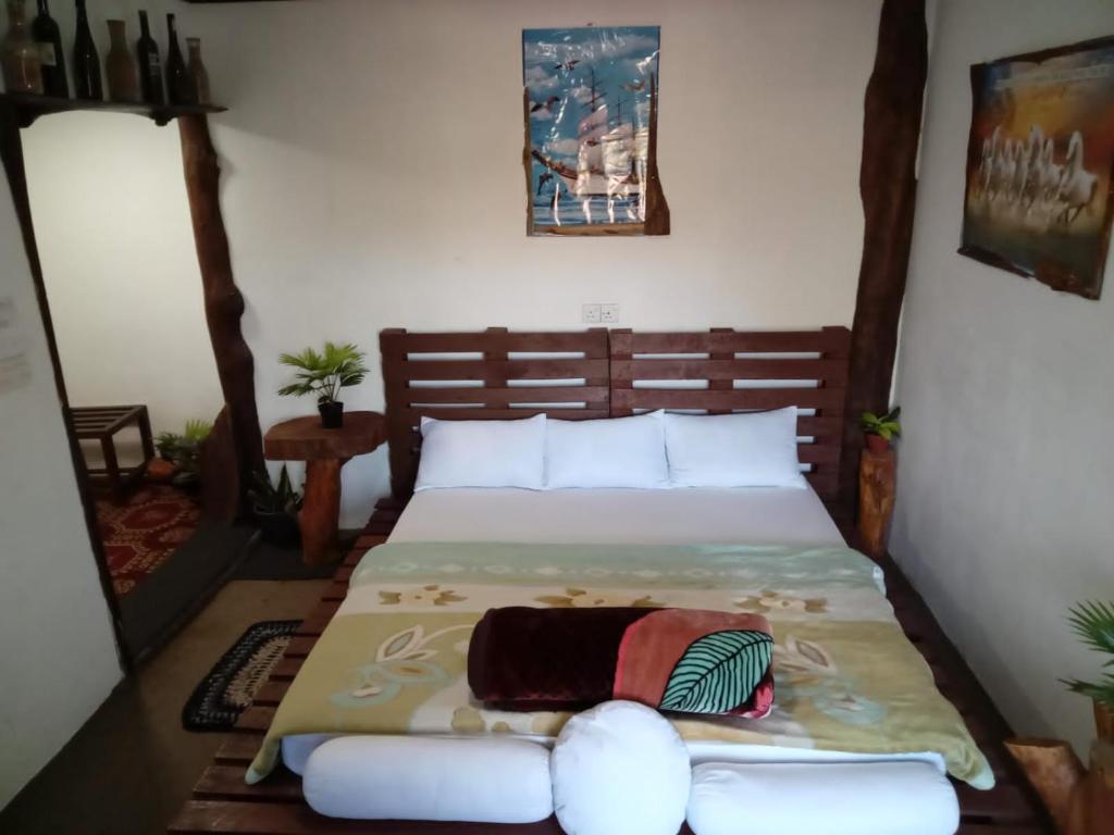 Postel nebo postele na pokoji v ubytování 20/20 wood cabana