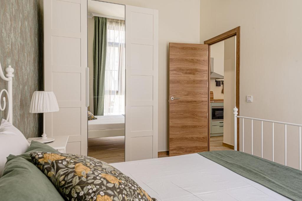 Postel nebo postele na pokoji v ubytování Simone Apartments