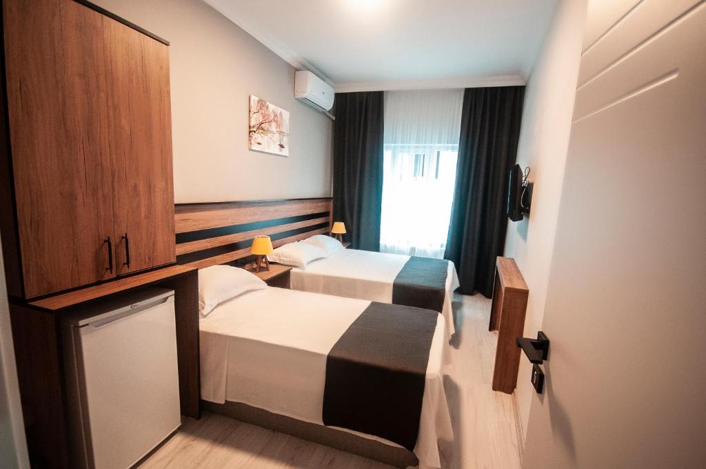 Postel nebo postele na pokoji v ubytování MiLAROOM