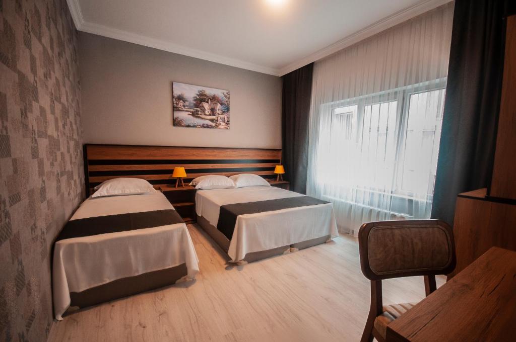 Postel nebo postele na pokoji v ubytování MiLAROOM