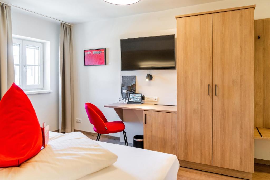 TV a/nebo společenská místnost v ubytování Hotel Rosenvilla