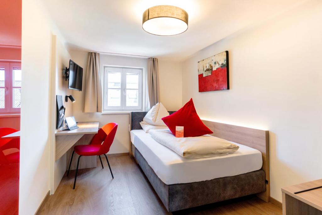 Postel nebo postele na pokoji v ubytování Hotel Rosenvilla