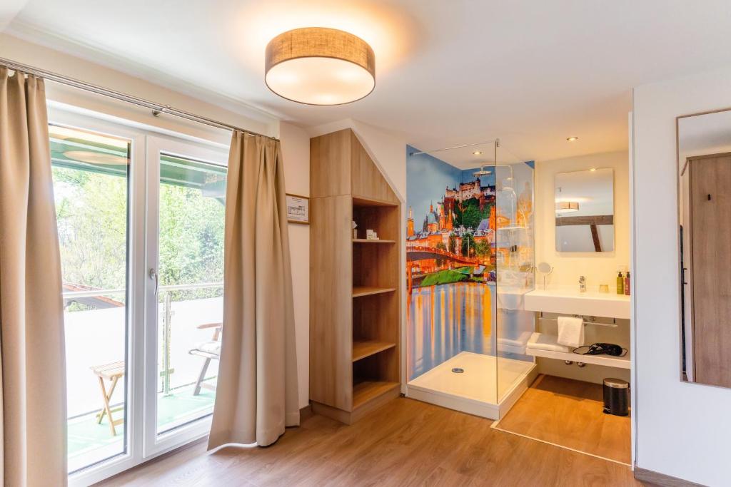 Postel nebo postele na pokoji v ubytování Hotel Rosenvilla