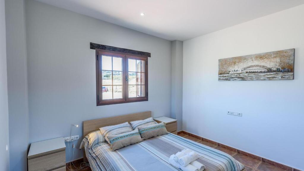 Posteľ alebo postele v izbe v ubytovaní Villa Mariana Ronda by Ruralidays