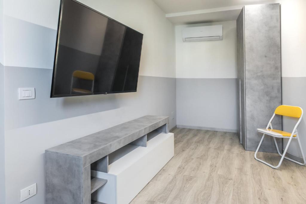 TV a/nebo společenská místnost v ubytování PETIT casa vacanze
