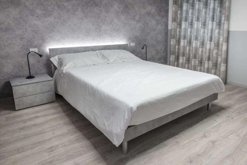 Postel nebo postele na pokoji v ubytování PETIT casa vacanze