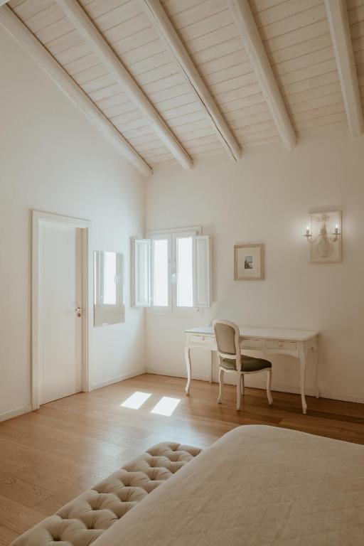 Postel nebo postele na pokoji v ubytování Relais Il Mignano
