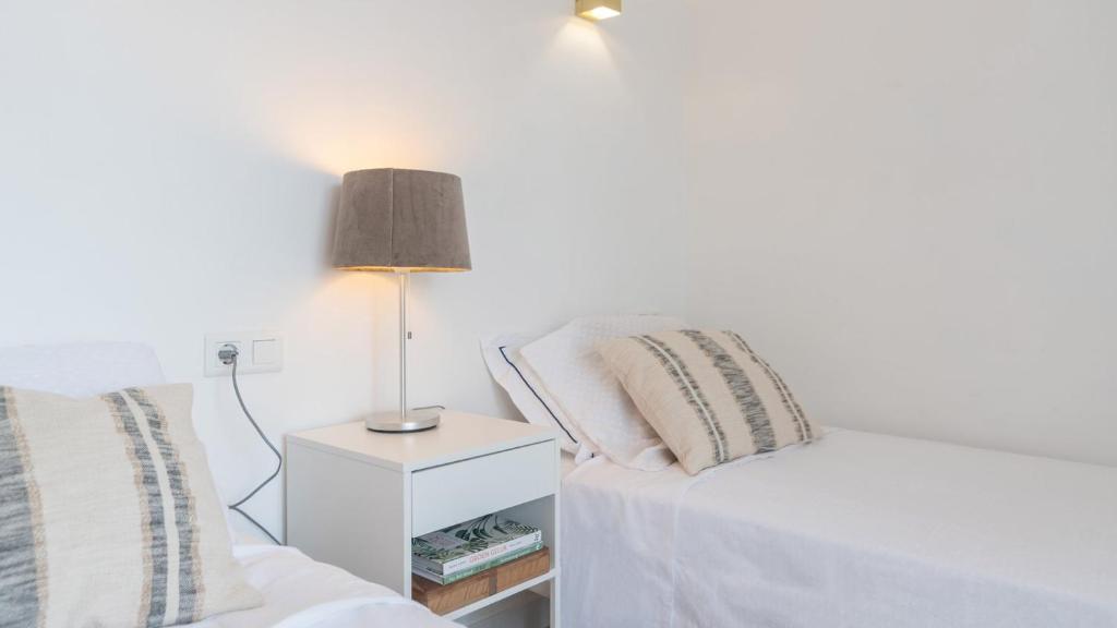 Postel nebo postele na pokoji v ubytování Villa Tres Flores Cómpeta by Ruralidays
