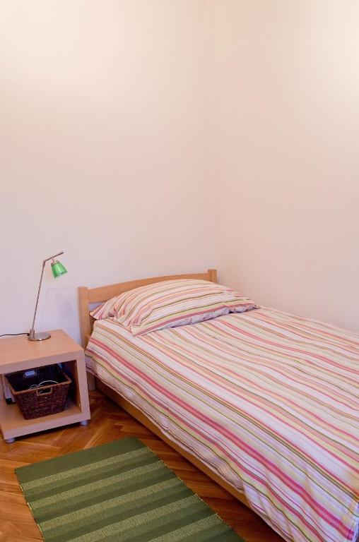 Postel nebo postele na pokoji v ubytování Apartments Zagy