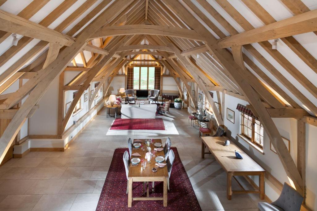 an overhead view of a living room with wooden ceilings at Lower Farm Barn in Hungerford