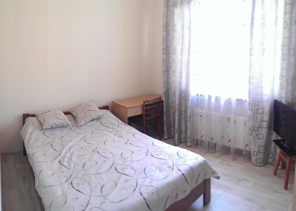 Postel nebo postele na pokoji v ubytování Гостевой Дом у Моря, Guest House by the Sea