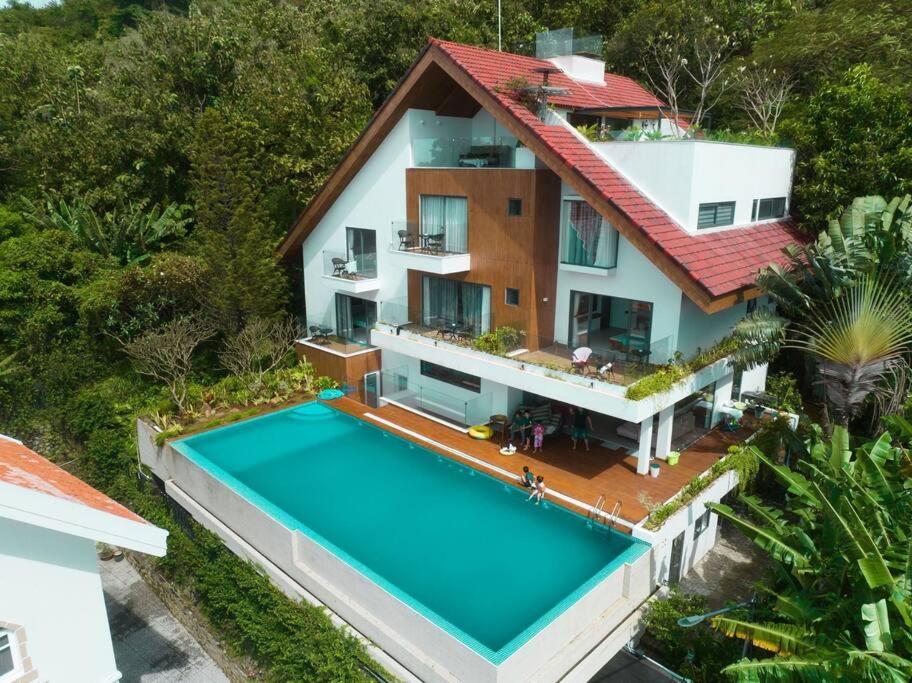 an aerial view of a house with a swimming pool at Trần Phú Villa Sea View in Vung Tau