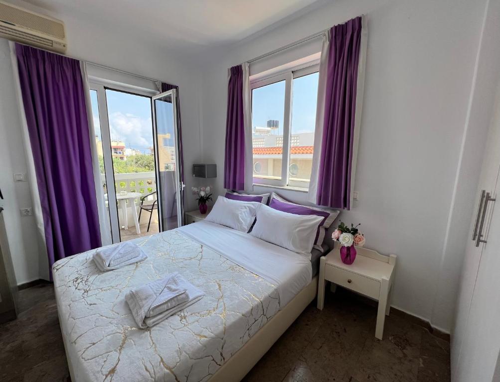 Postel nebo postele na pokoji v ubytování Maria Hotel Sisi