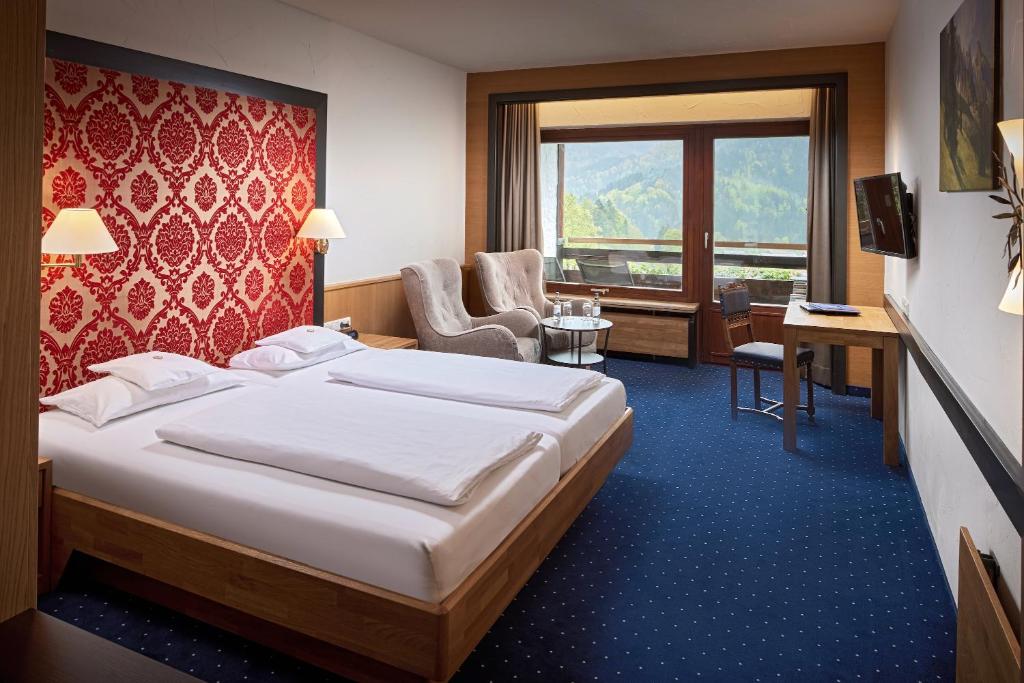 Postel nebo postele na pokoji v ubytování Hotel Prinz-Luitpold-Bad