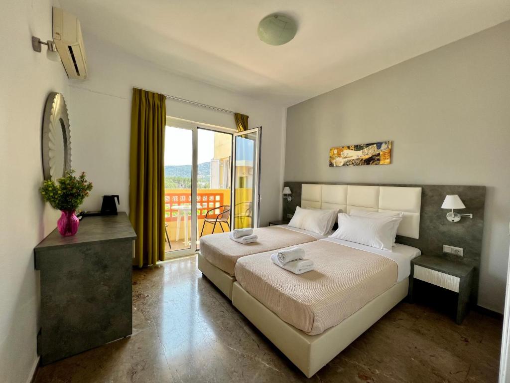 Postel nebo postele na pokoji v ubytování Maria Hotel Sisi