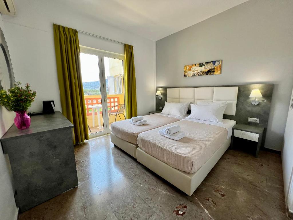 Postel nebo postele na pokoji v ubytování Maria Hotel Sisi