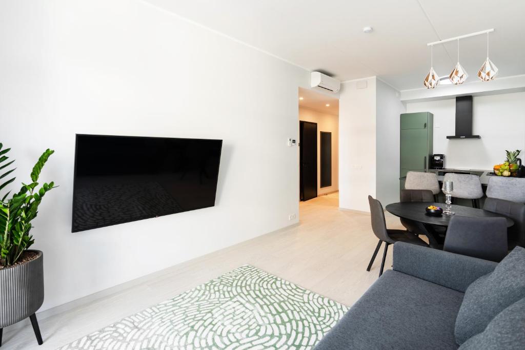 TV a/nebo společenská místnost v ubytování Pärnu Verde Apartments