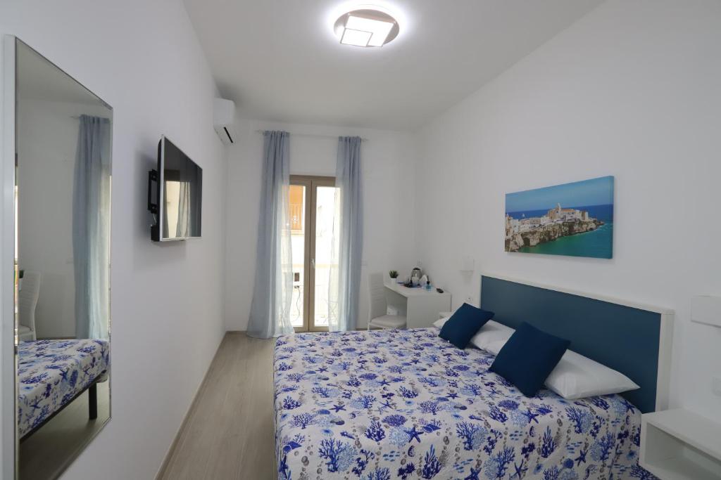 Postel nebo postele na pokoji v ubytování B&B AlMare