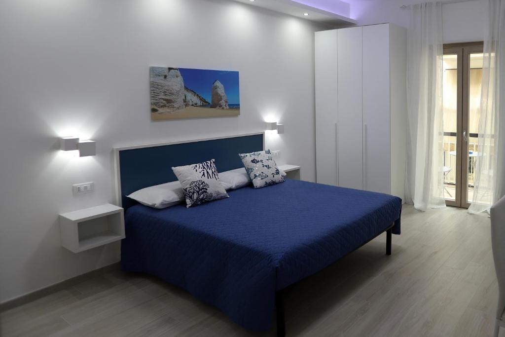 Postel nebo postele na pokoji v ubytování B&B AlMare