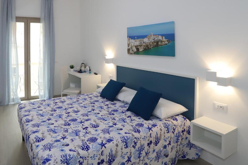 Postel nebo postele na pokoji v ubytování B&B AlMare