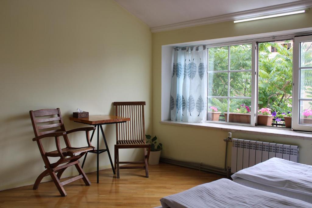 Postel nebo postele na pokoji v ubytování JR's House
