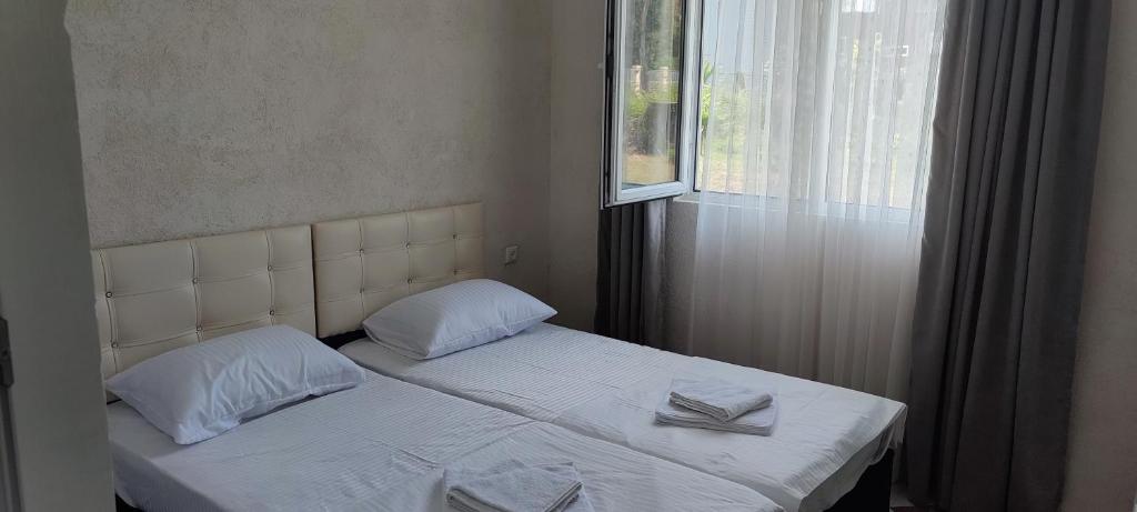 Postel nebo postele na pokoji v ubytování ოცნების სახლი dream house
