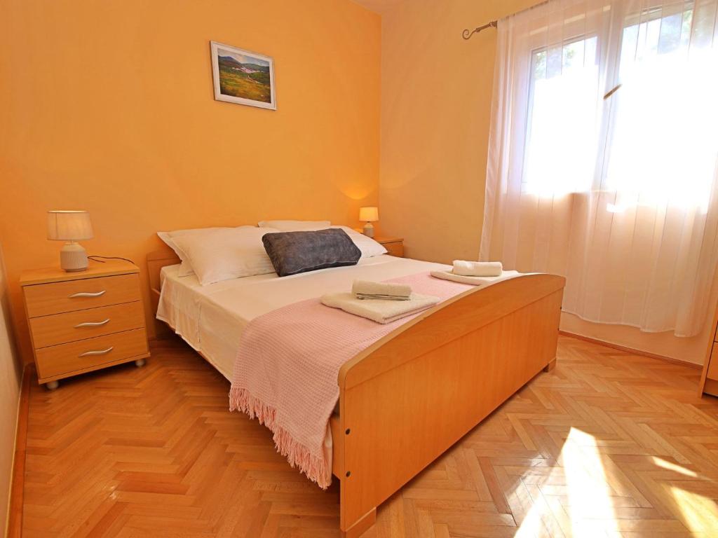 Łóżko lub łóżka w pokoju w obiekcie Holiday Home Anderson by Interhome