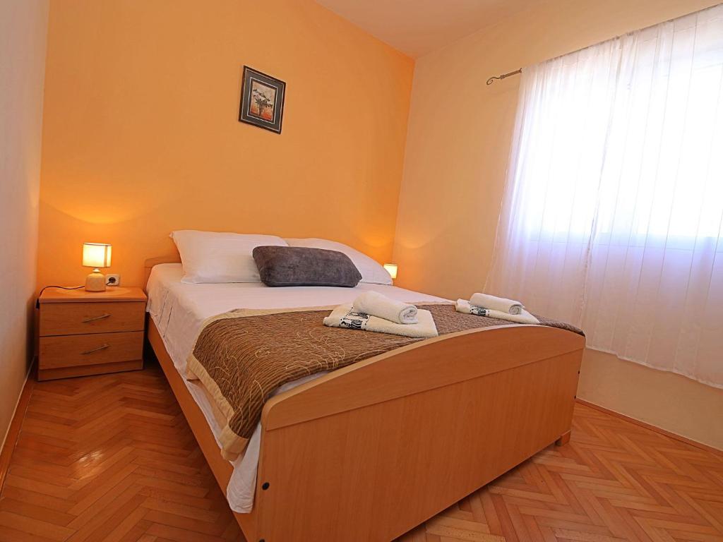Łóżko lub łóżka w pokoju w obiekcie Holiday Home Anderson by Interhome