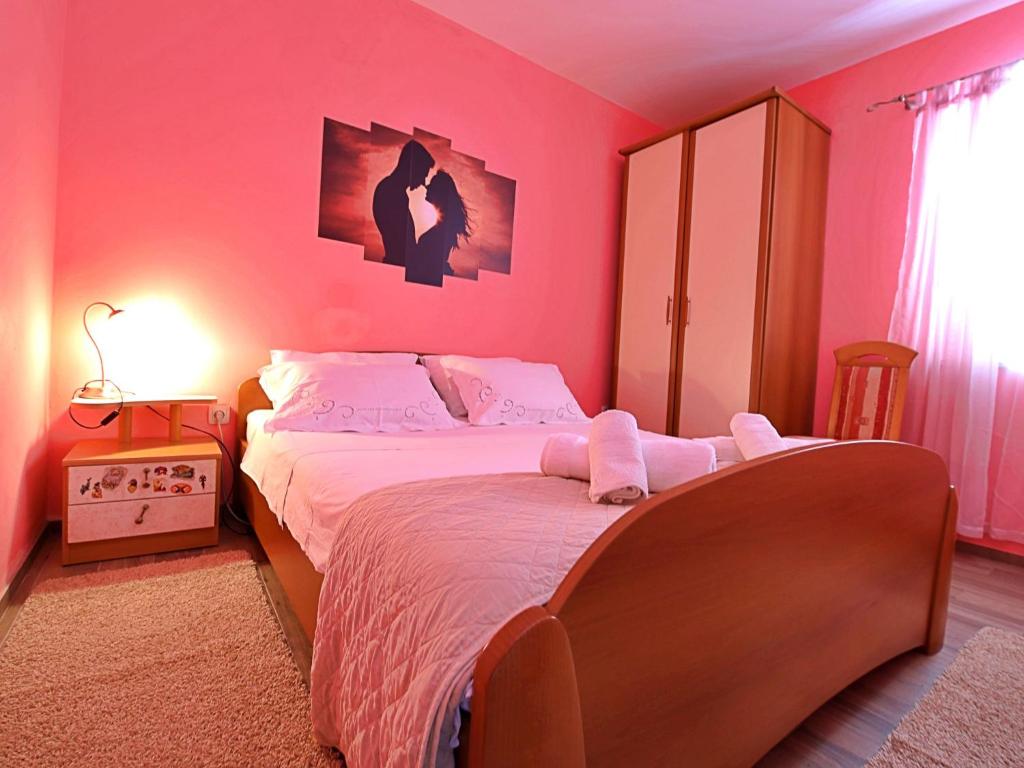 Łóżko lub łóżka w pokoju w obiekcie Holiday Home Damjanović by Interhome
