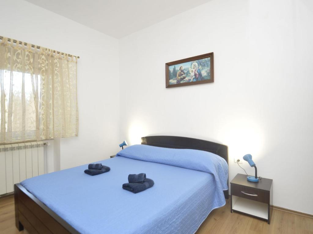 Posteľ alebo postele v izbe v ubytovaní Apartment Franko 2 by Interhome