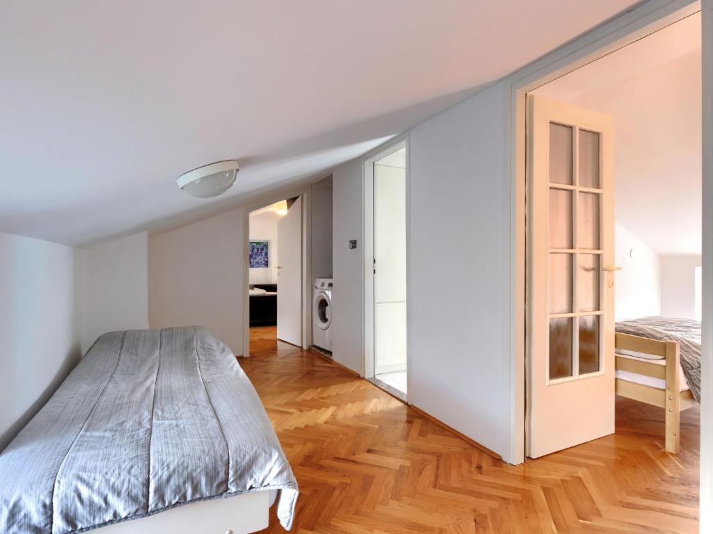 Posteľ alebo postele v izbe v ubytovaní Holiday Home Erika by Interhome