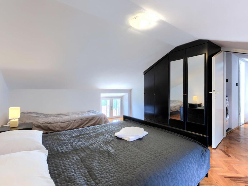 Posteľ alebo postele v izbe v ubytovaní Holiday Home Erika by Interhome