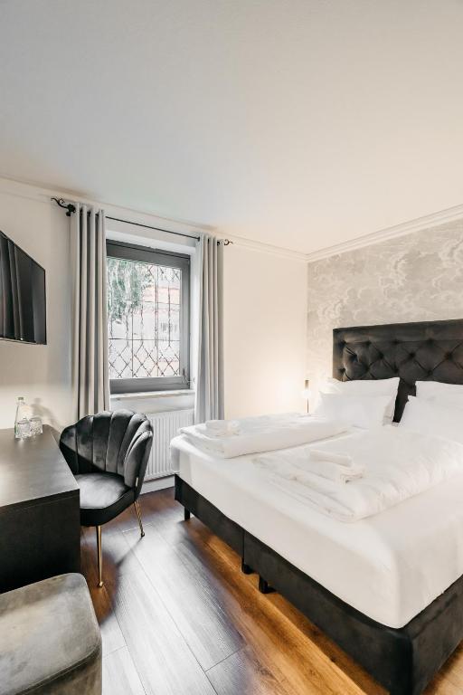 Ein Bett oder Betten in einem Zimmer der Unterkunft Hotel Riesengebirge