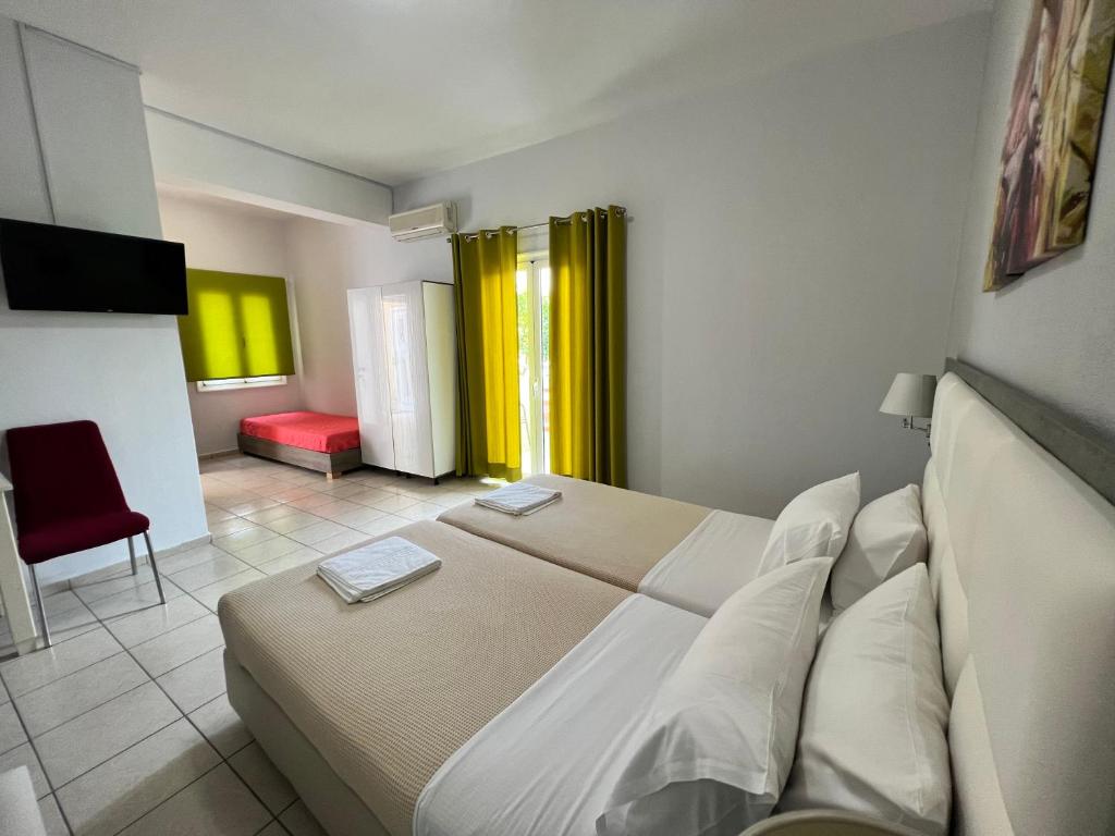 Postel nebo postele na pokoji v ubytování Maria Hotel Sisi