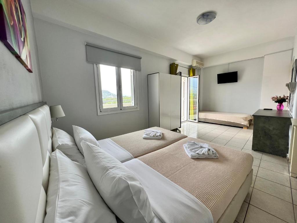 Postel nebo postele na pokoji v ubytování Maria Hotel Sisi