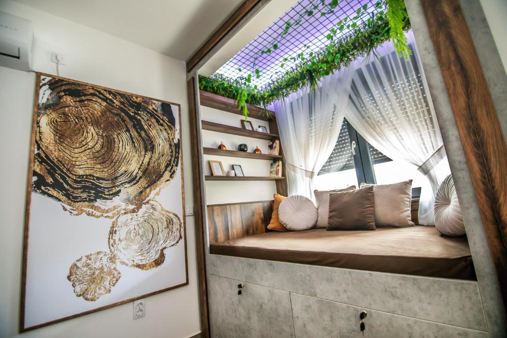 Ένα ή περισσότερα κρεβάτια σε δωμάτιο στο Royal luxury apartment Vršac