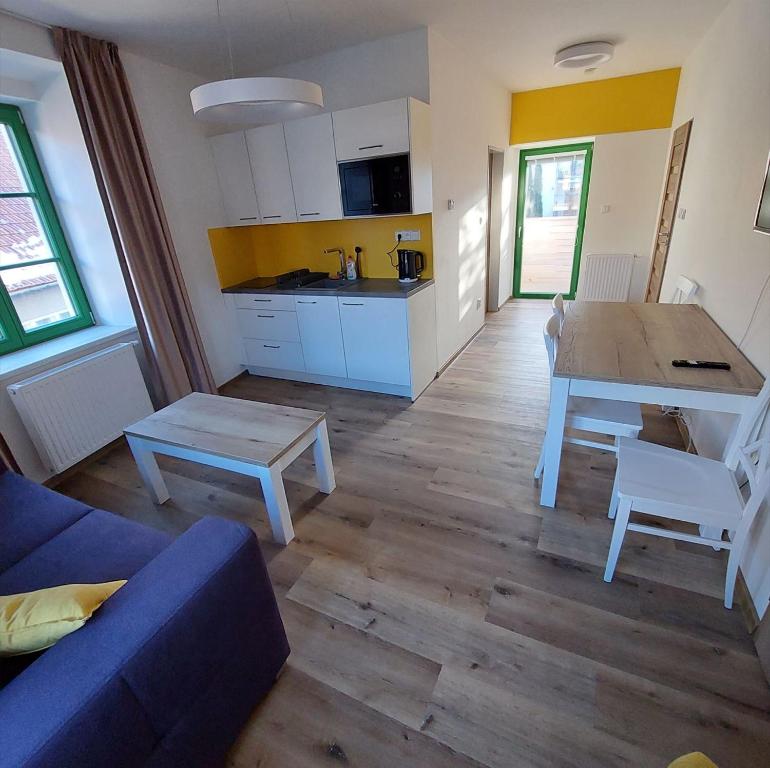 Kuchyň nebo kuchyňský kout v ubytování Apartmány Phlora