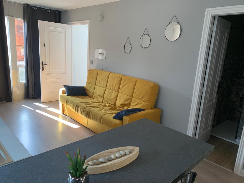 Posezení v ubytování NOARU Apartamentos