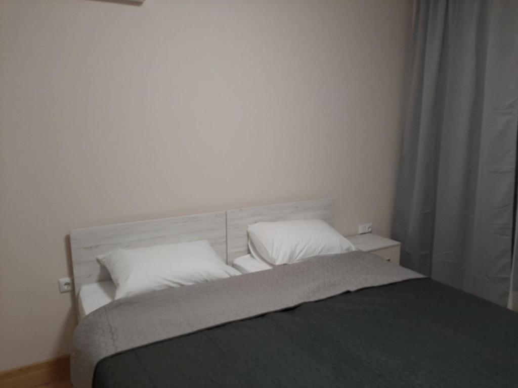 Postel nebo postele na pokoji v ubytování Апартамент Deluxe 7