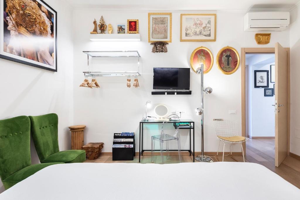 Televízia a/alebo spoločenská miestnosť v ubytovaní Matteotti Apartment