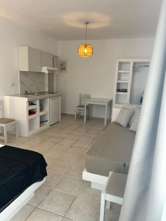 Kuchyň nebo kuchyňský kout v ubytování Apollonia Studios