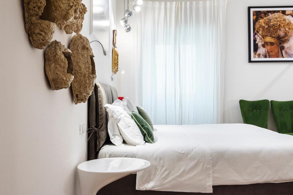 Posteľ alebo postele v izbe v ubytovaní Matteotti Apartment