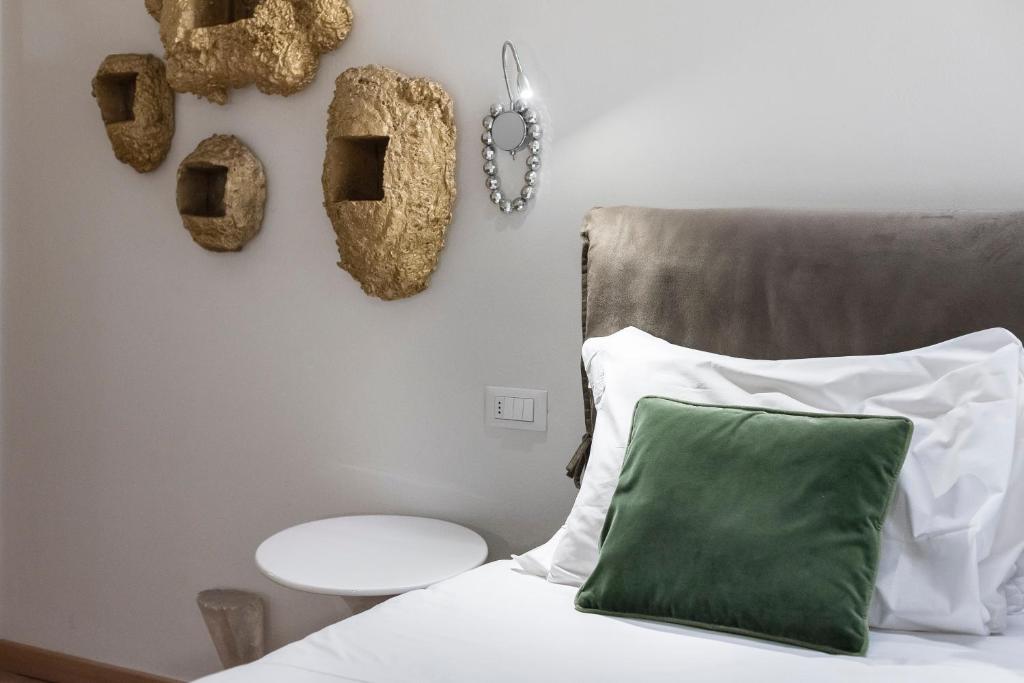 Posteľ alebo postele v izbe v ubytovaní Matteotti Apartment