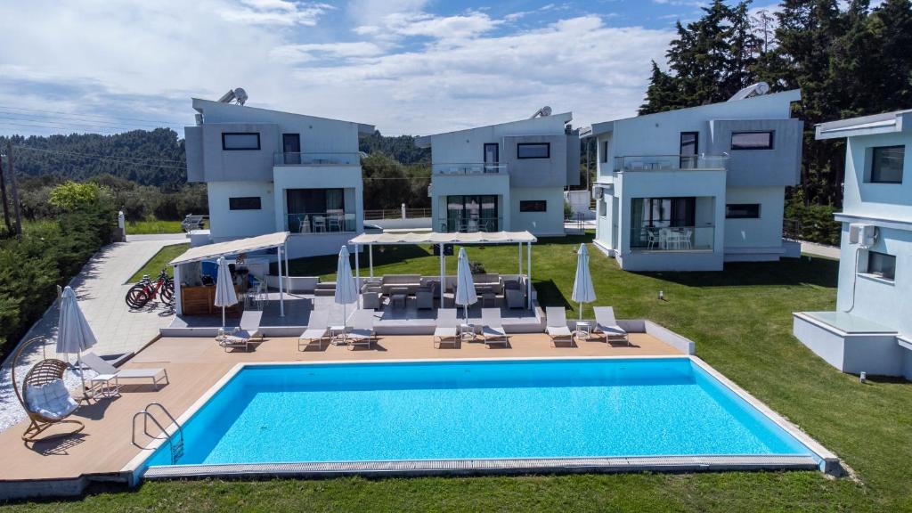 an aerial view of a villa with a swimming pool at Blue Avenue in Paliouri