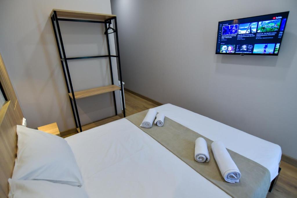 Postel nebo postele na pokoji v ubytování Euro Hotel Kutaisi