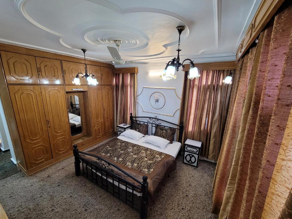 Postel nebo postele na pokoji v ubytování Taha Inn Home comfort
