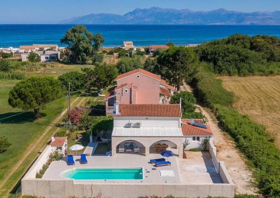 an aerial view of a house with a swimming pool at Sea Breeze Coastal House in Almyros Beach in Almiros Beach