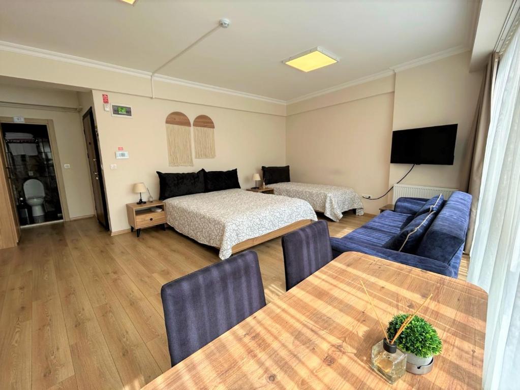Posteľ alebo postele v izbe v ubytovaní ZMF Pansiyon